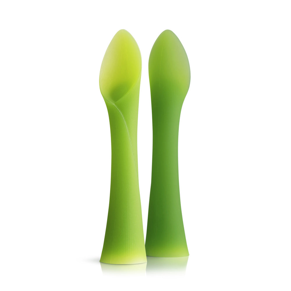 Olababy silicone training spoon designed for baby-led weaning, standing upright on its base