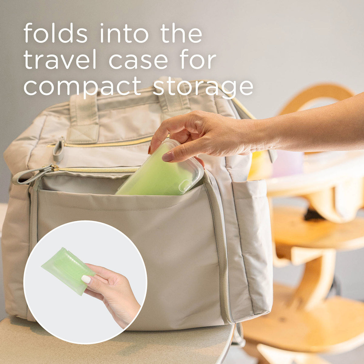 Travel friendly lightweight silicone baby bib rolling up compactly to fit inside a diaper bag pocket