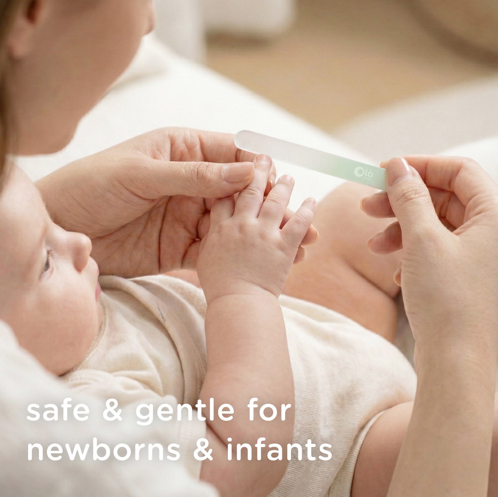 Olababy premium mint green baby glass nail file 2-pack for newborns and infants on a white background.