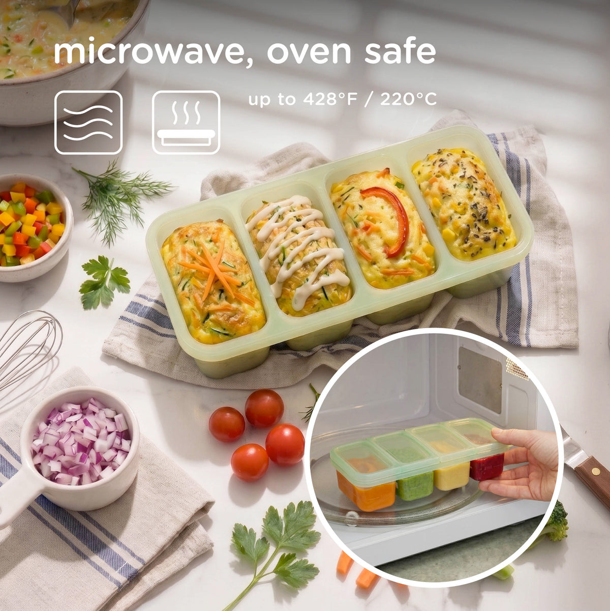 A 4-compartment silicone baby food storage tray in a light sage green color, shown filled with prepared baby foods. The image includes text overlays stating 'microwave, oven safe up to 428°F / 220°C' along with icons, a lifestyle tabletop setting with food ingredients, and a circular inset demonstrating the tray inside a microwave.