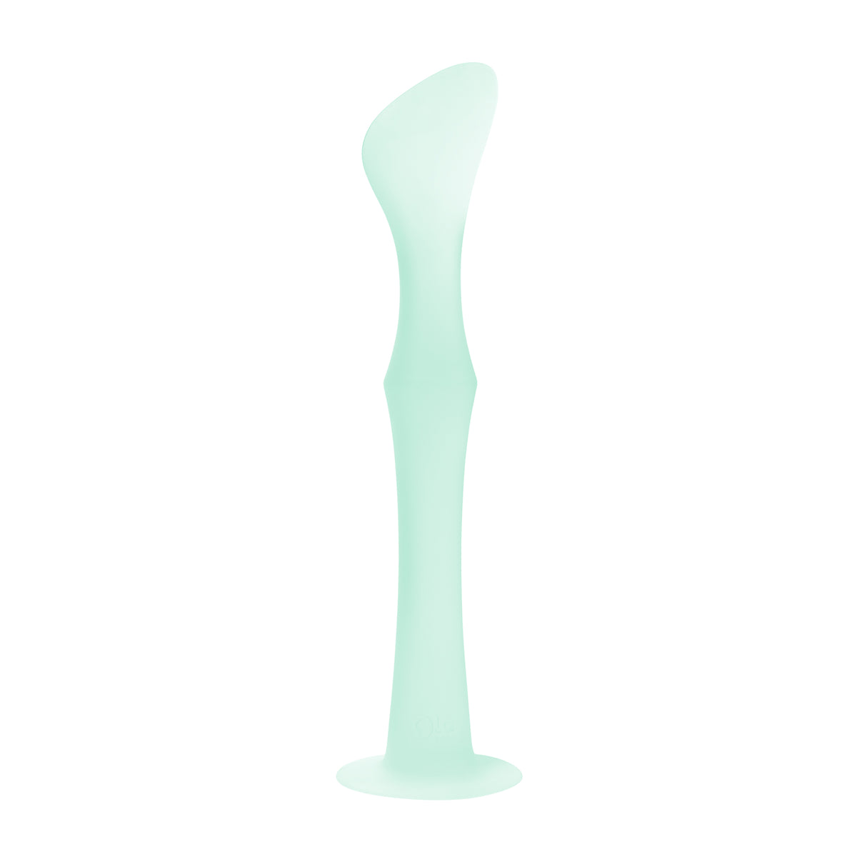 Olababy mint green silicone diaper cream applicator standing upright on its integrated suction cup base.